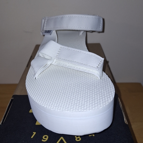 A pair of Teva W. Flatform Universal sandals in solid white in a ladies Size 9. - Picture 8 of 10